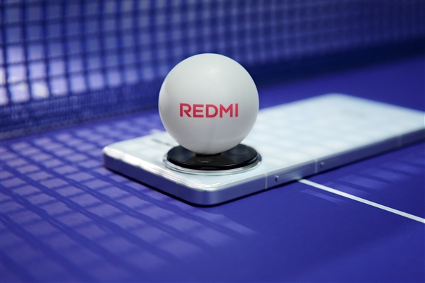 樊振东携REDMI K80海报霸气亮相！雷军：当红不让